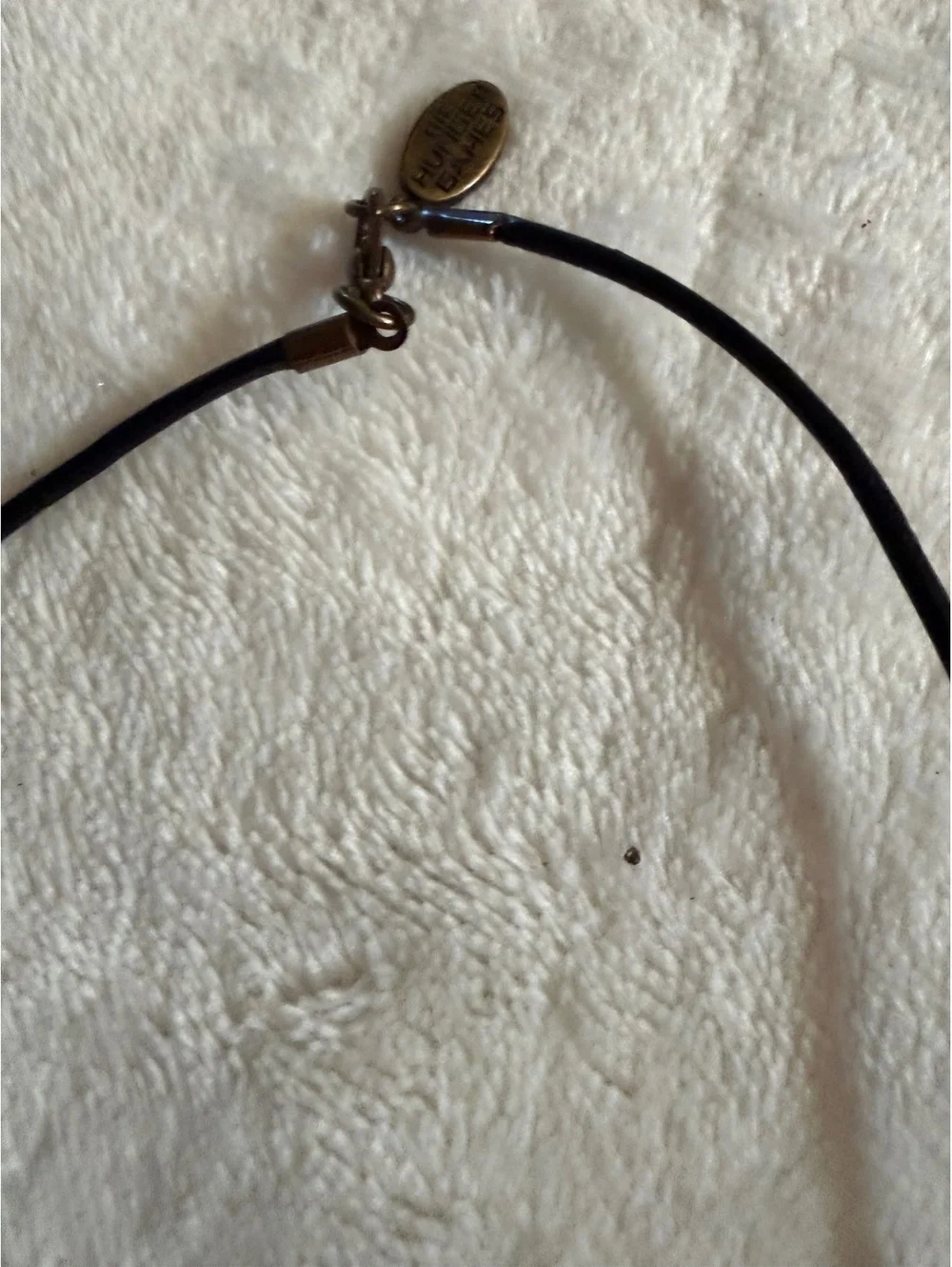 NECA Hunger Games Mockingjay pendant necklace brass medallion black leather cord